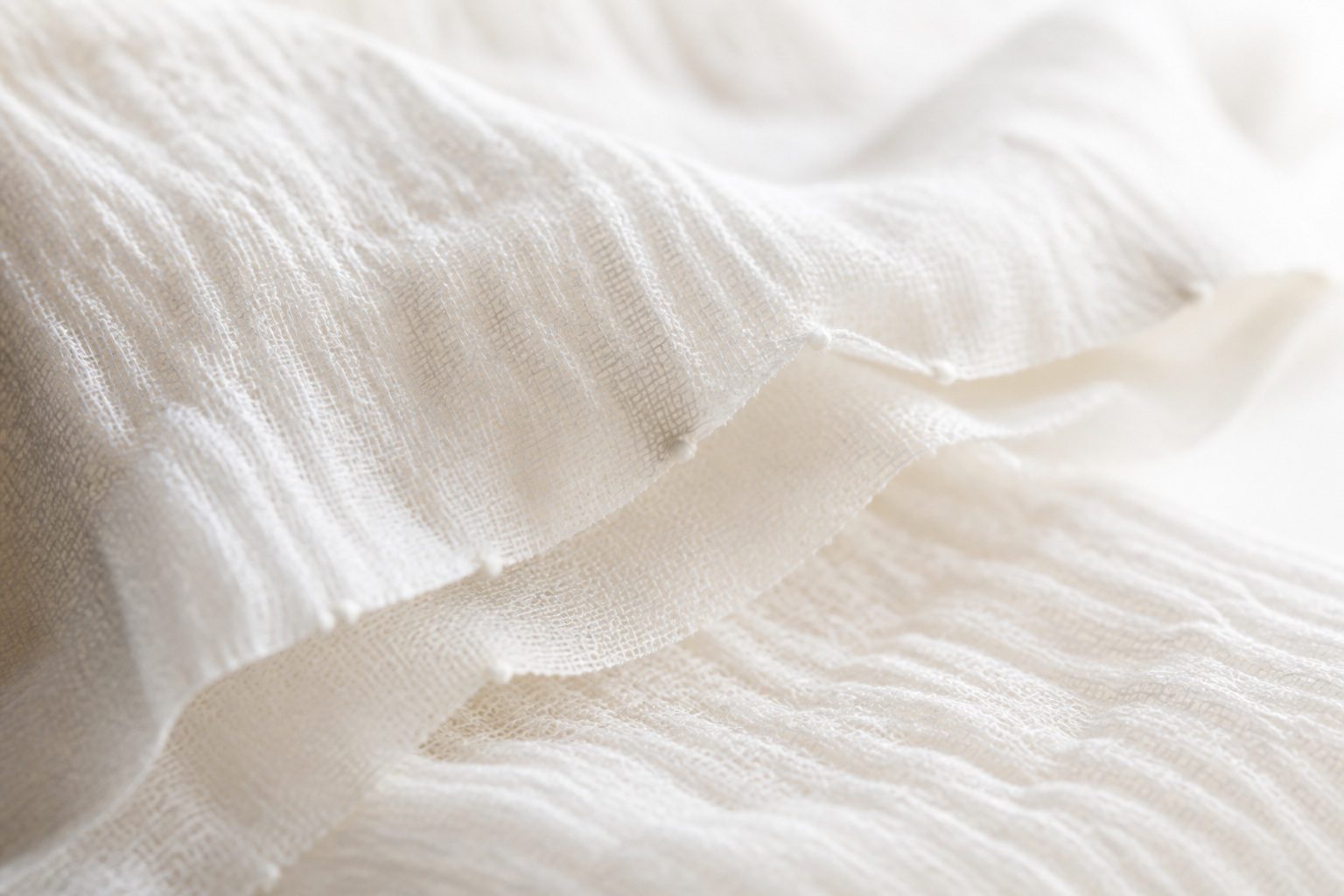 Two airy layers of ivory cotton double gauze