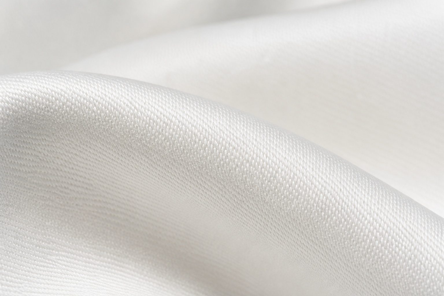 White sateen with a soft pearl sheen and a heavy drape